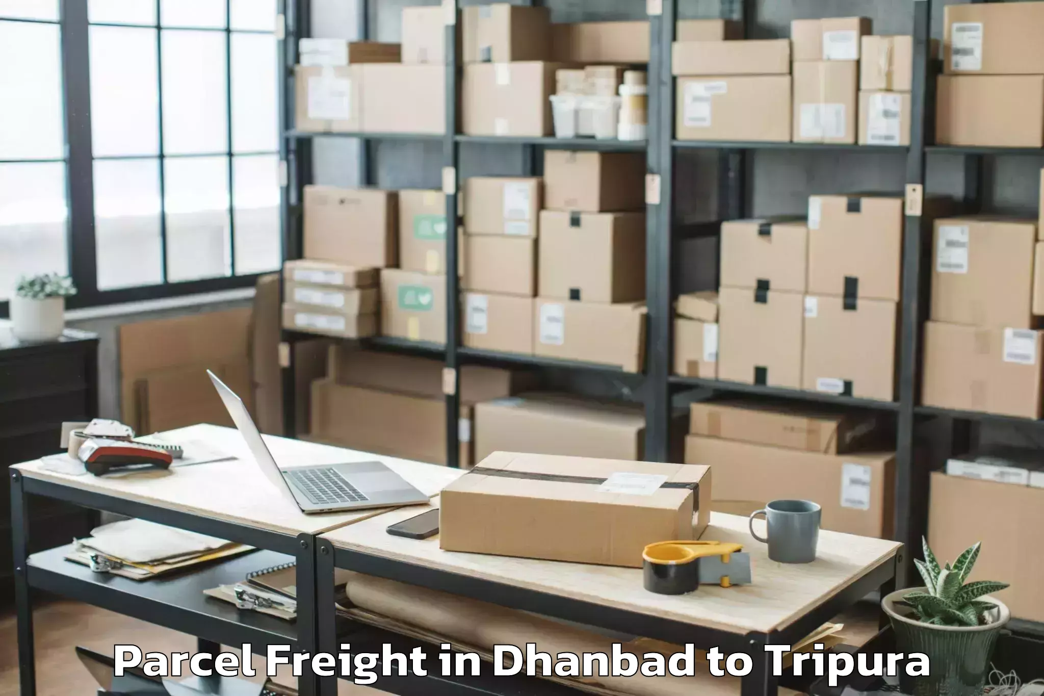 Get Dhanbad to Kamalpur Airport Ixq Parcel Freight